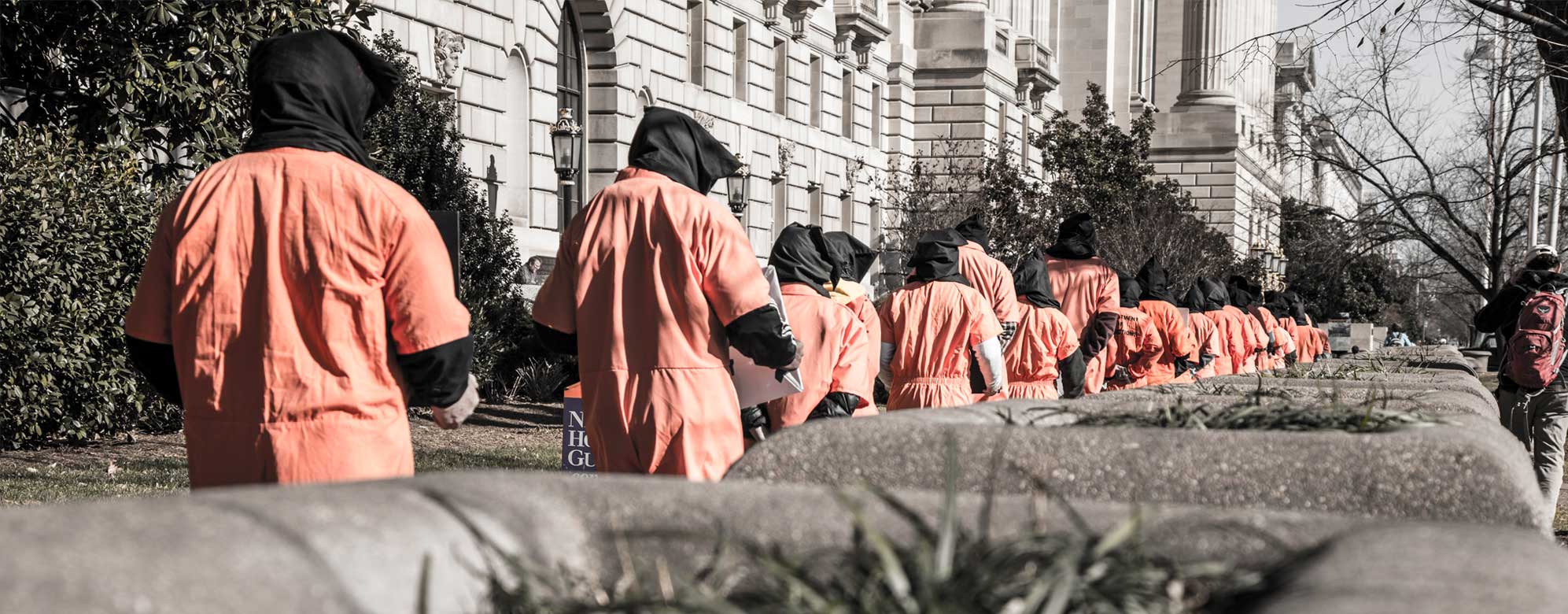 Guantánamo Protesters File Past the Department of Justice